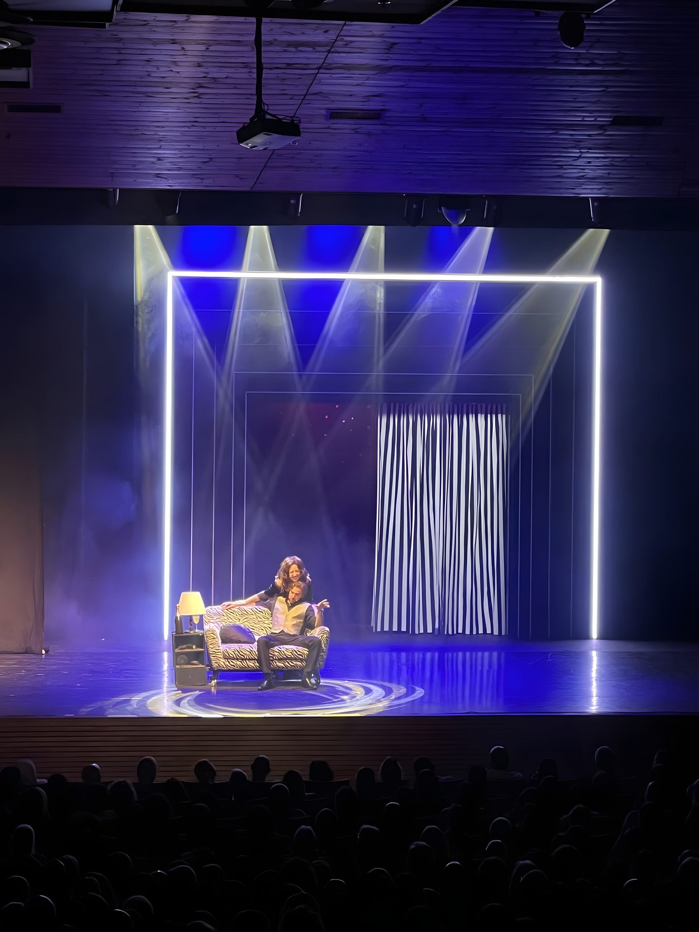Mary Lou - Neon portal over the living-room scene